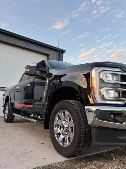 Black Ford Super Duty service truck for Blackwater Pumping after exterior detailing