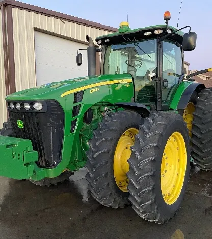 Green John Deere tractor exterior after detailing in a driveway