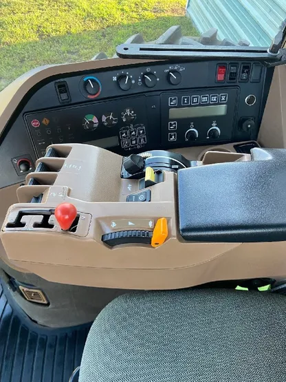 Tractor cab interior with clean controls and seating after detailing
